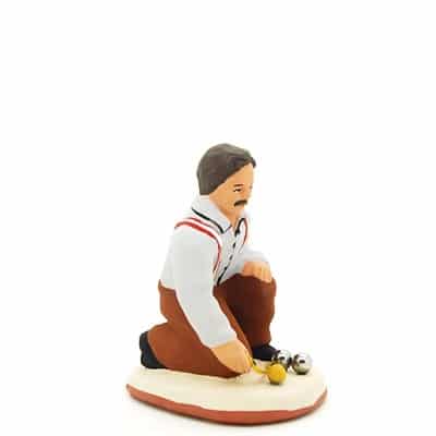 santon de provence peint à la main bouliste accroupi profil