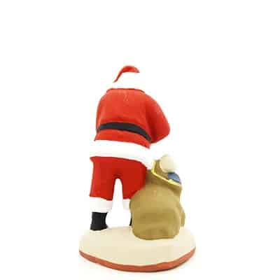 santon de provence peint à la main papa noel sac aux pieds dos