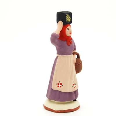 santon peint à la main femme au fourreau profil