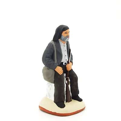 santon de Provence peint mains vieux corse au fusil profil