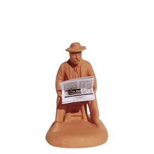 Homme assis au journal