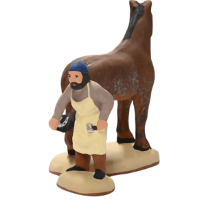 Le maréchal ferre son cheval